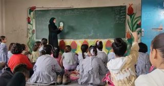 Gaza’s UNRWA schools are classrooms by day, displacement shelters at night